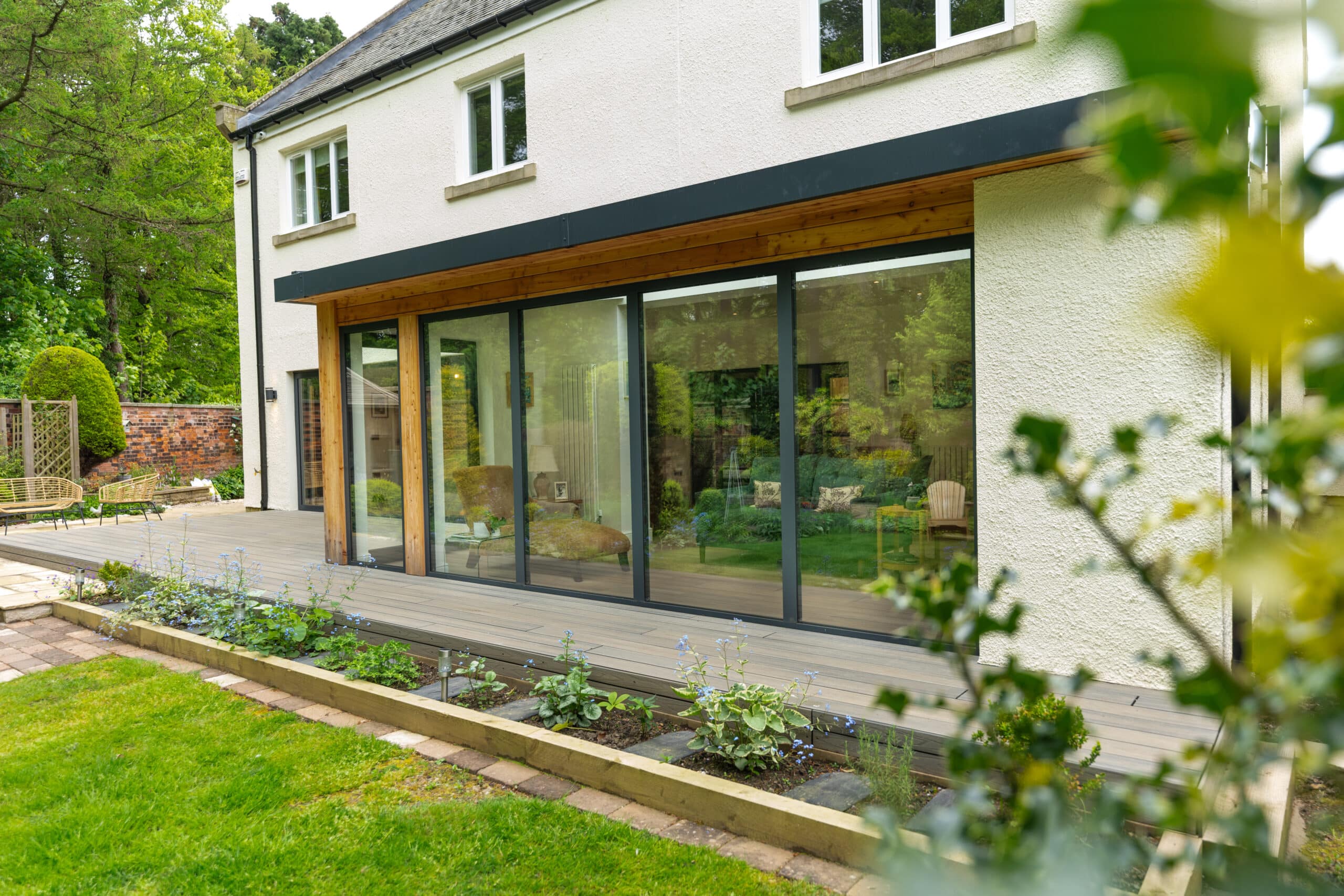 Exterior of a house in Midlothian - bifold doors installed by Mark Smith Glazing